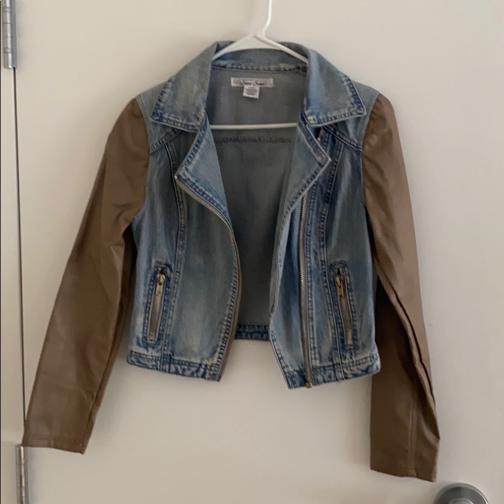 Jean jacket with tan leather sleeves